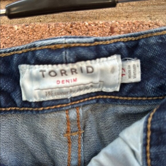 Torrid distressed Blue Jean Shorts with side lace detail - Picture 2 of 7